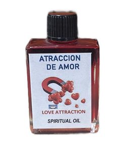 Frasco de aceite espiritual Atracción de Amor con etiqueta ilustrada de un imán y corazones rojos.